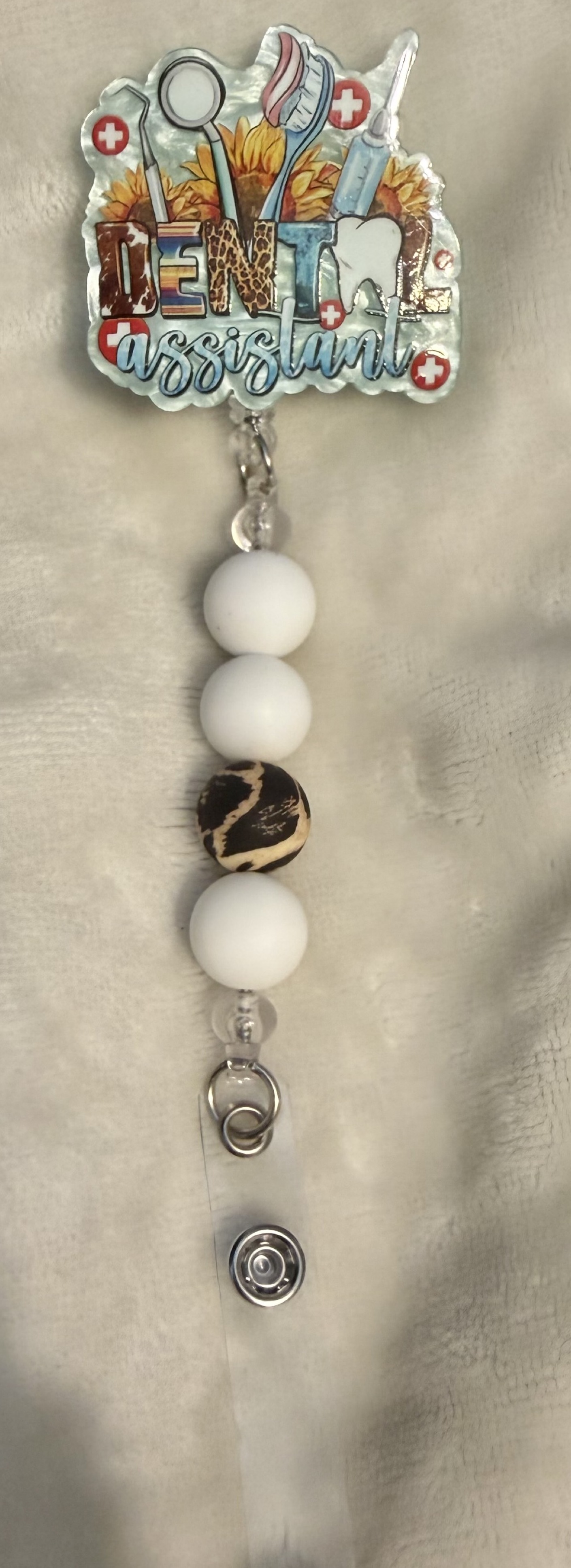 Snow Leopard Smile, Badge reel by Ain't That Some Crafts